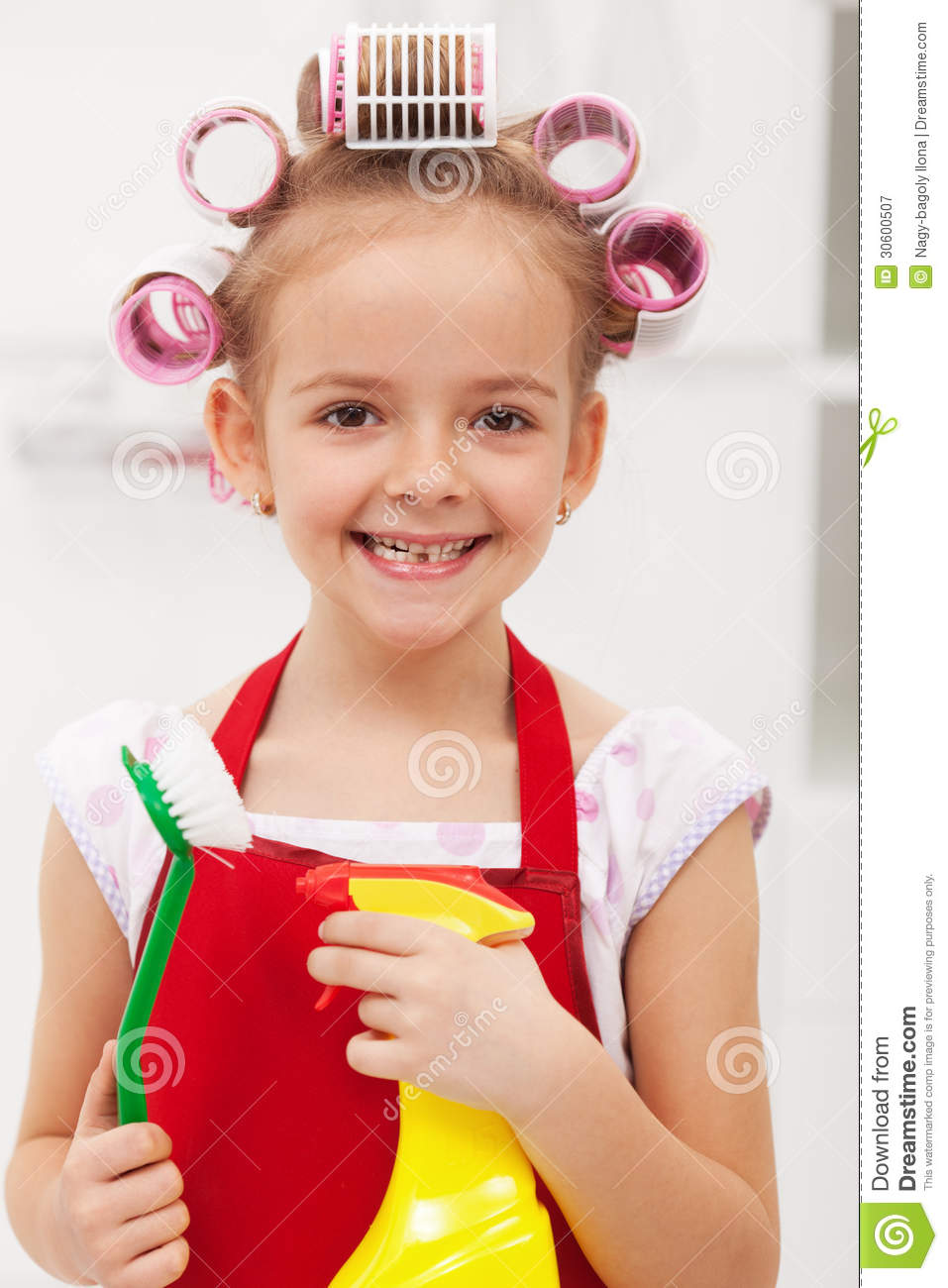 Little Girl With Cleaning Utensils Royalty Free Stock Photography    