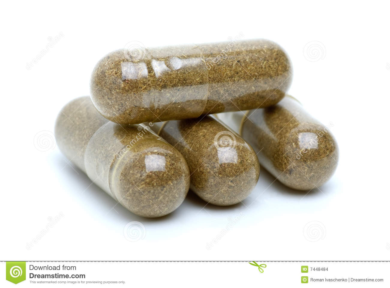 Four Brown Homeopathic Pills Isolated On The White Background