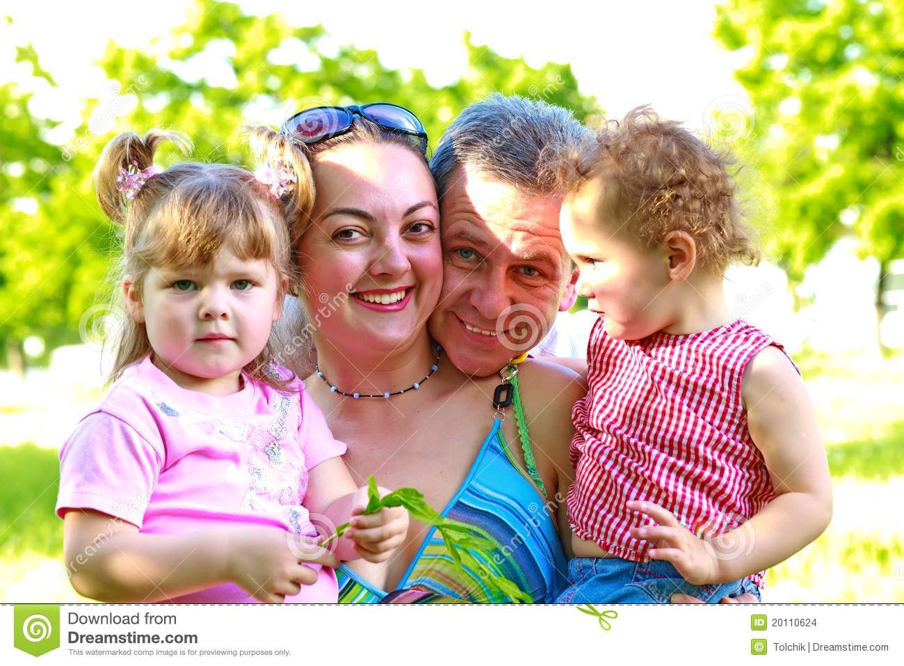 Happy Family With Two Daughters Outdoors Stock Images   Image