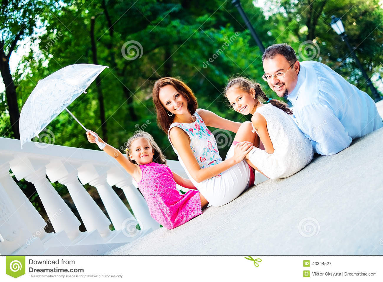 Married Couple With Two Daughters For A Walk In The Park Mr Yes Pr    