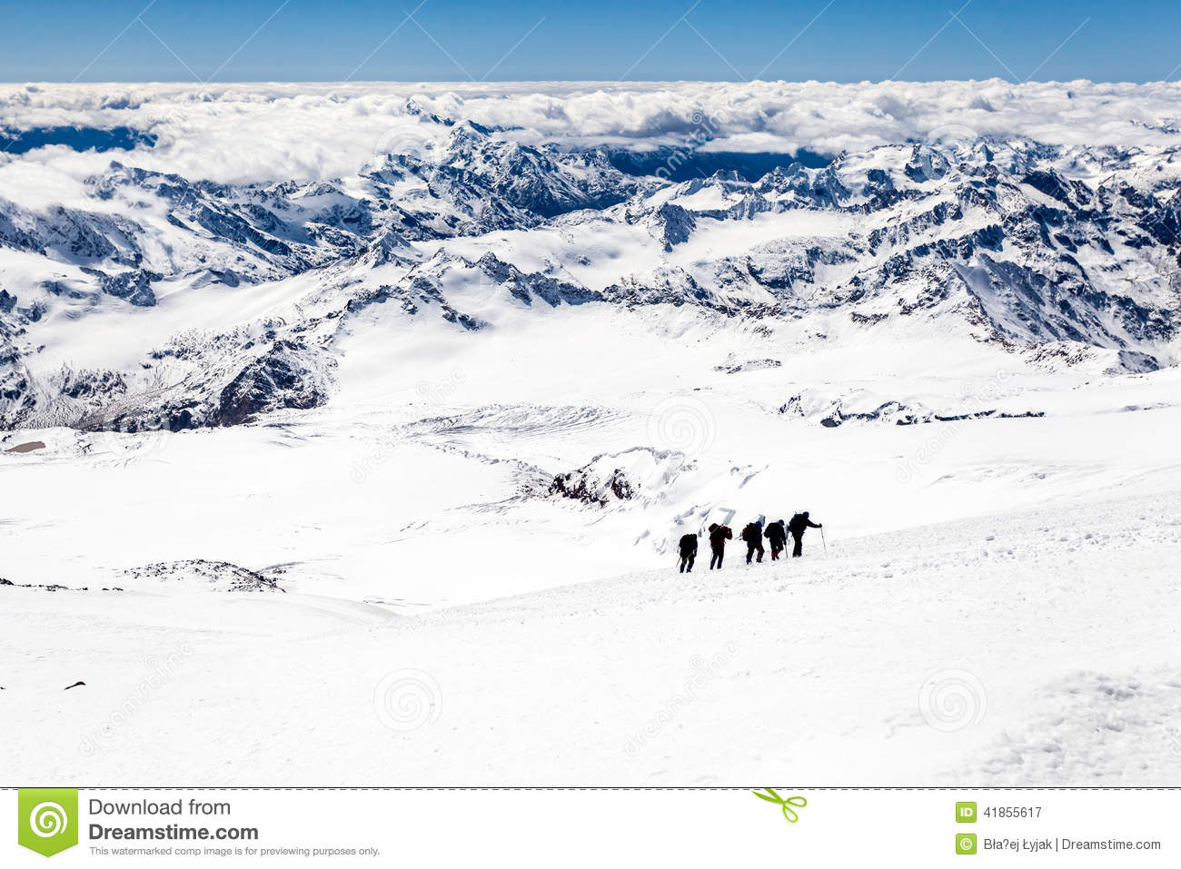 People Hiking Silhouette And Climbing On Snow In High Mountain Elbrus