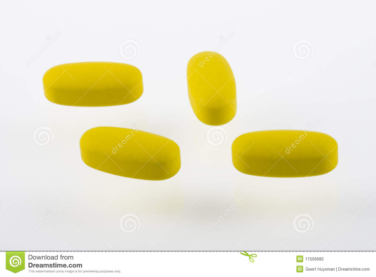 Yellow Pills On White Background Stock Photo   Image  11556680