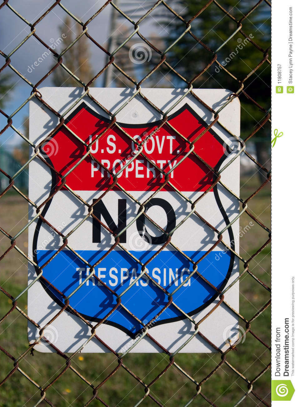 Government Property No Trespassing Sign Hung On A Rusty Chain