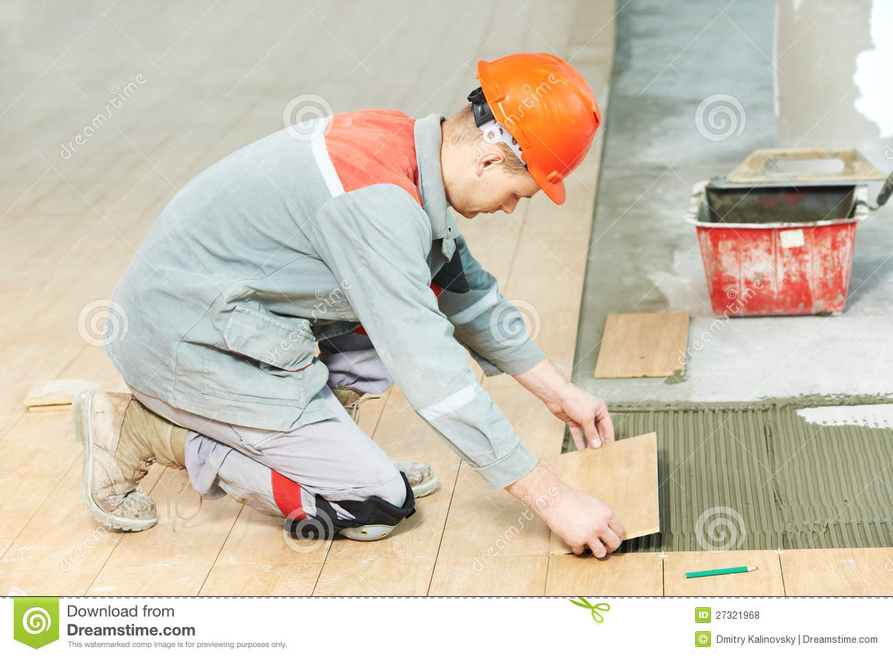 Tiler At Industrial Floor Tiling Renovation Work Royalty Free Stock