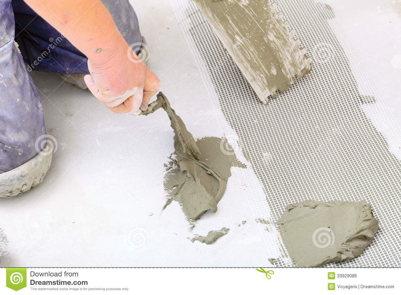 Worker Tiler Is Tiling Ceramic Tile Floor Adhesive Trowel With