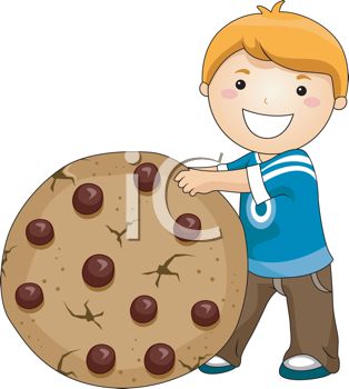 Picture Of A Happy Smiling Boy Holding A Large Chocolate Chip Cookie