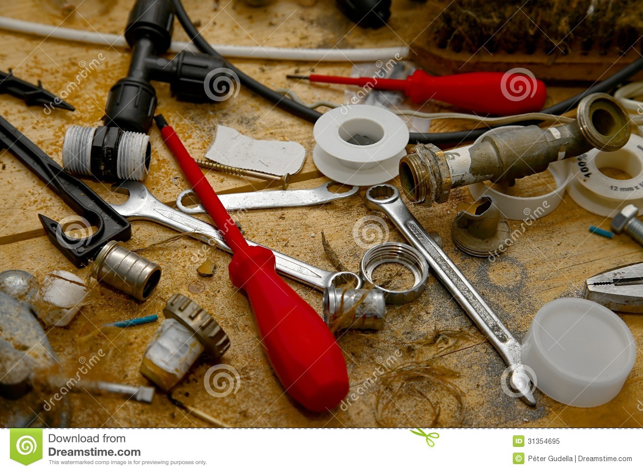 Messy Table Of Tools In A Workshop