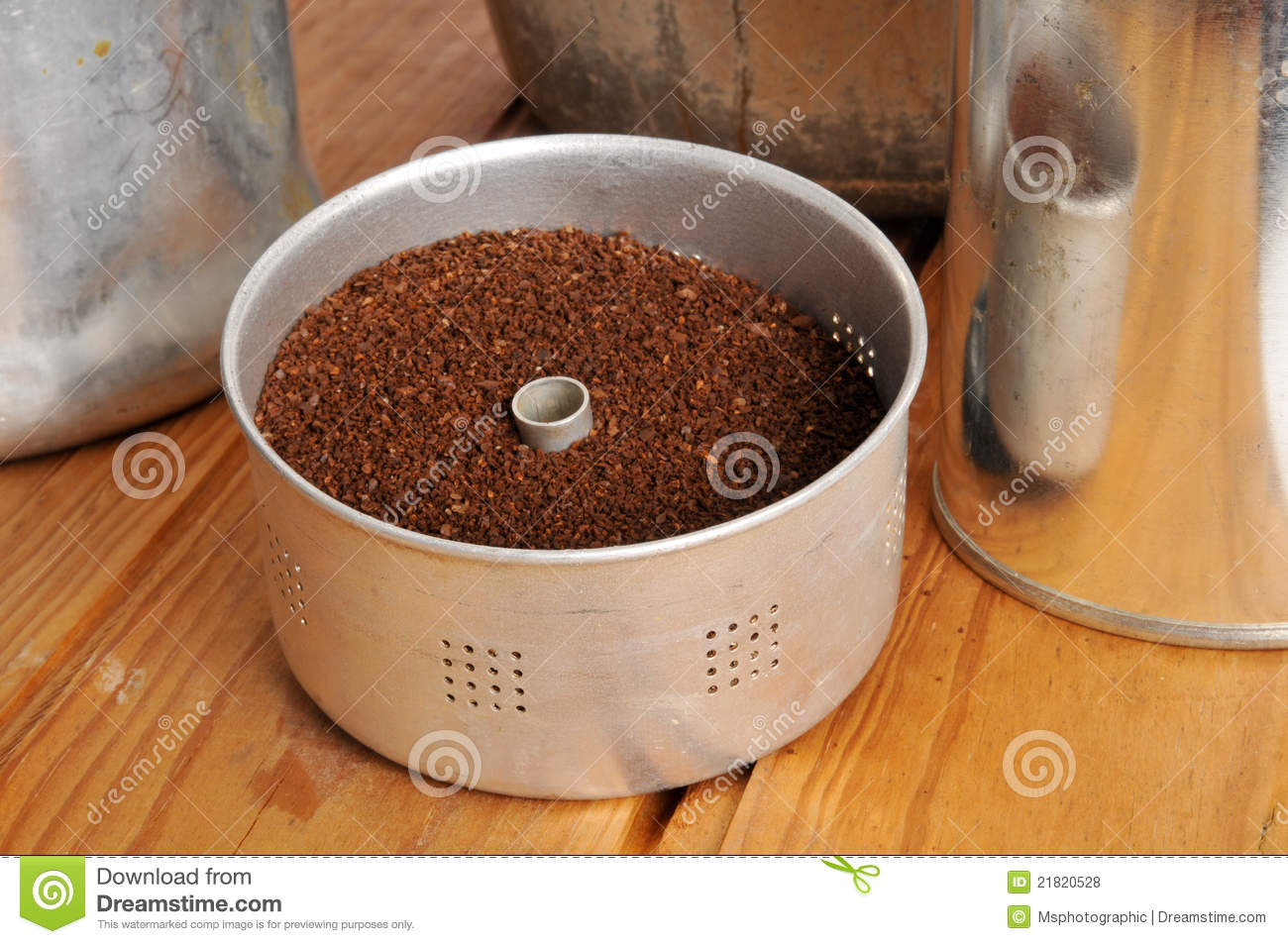 Fresh Coffee Grounds In An Old Style Rustic Coffee Pot Basket