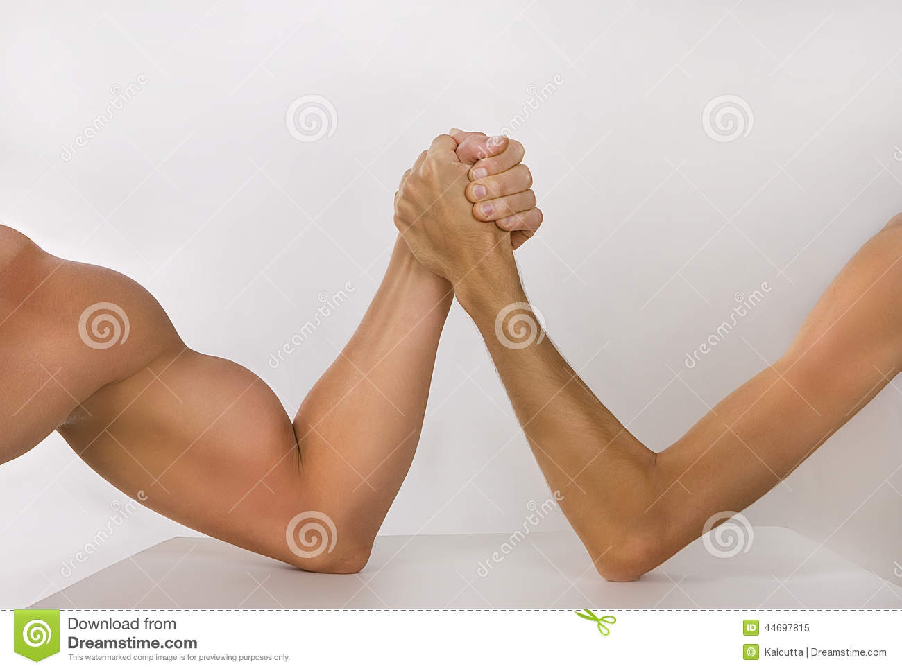 Two Hands Clasped Arm Wrestling  Strong And Weak  Unequal Match Stock    