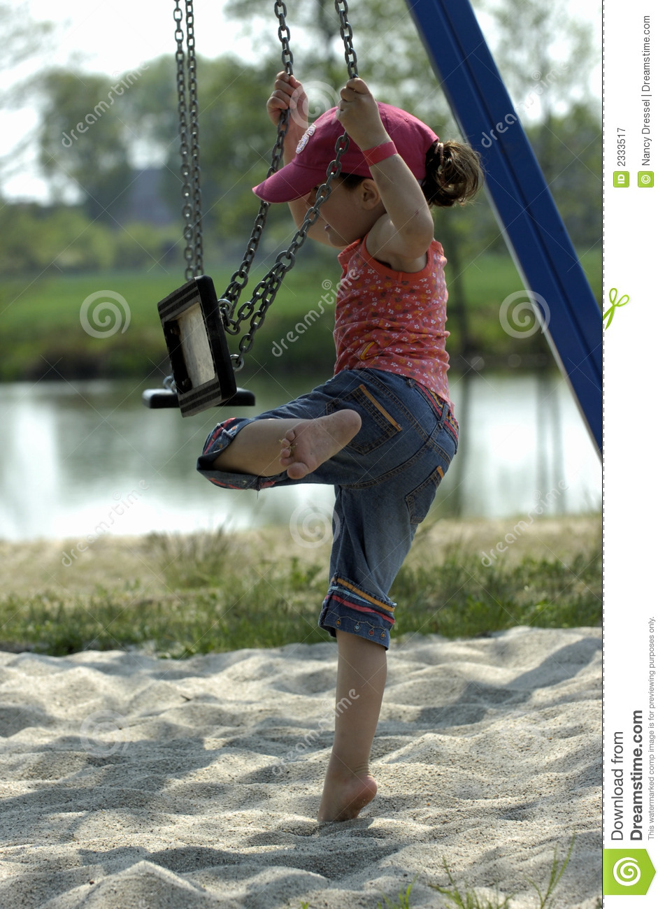 Little Girl Playing On A Swing Royalty Free Stock Photography   Image