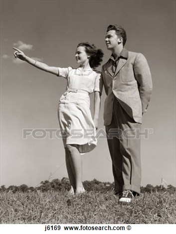 Stock Photograph Of 1940s Teenage Couple Standing Together Outdoors    