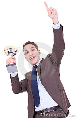     Man Holding A Trophy Aloft Over White Background  We Have A Winner