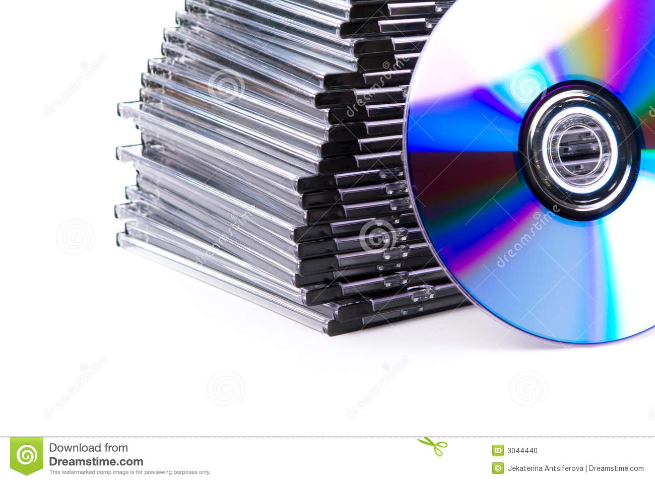 Side Of A Stack Of Cd Boxes With A Blue Cd In The Right Upper Corner