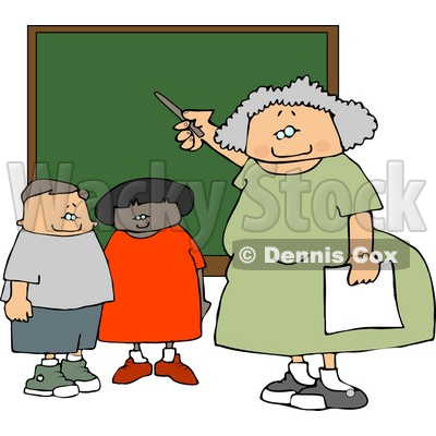 Female Elementary School Teacher Teaching Students In A Classroom On A