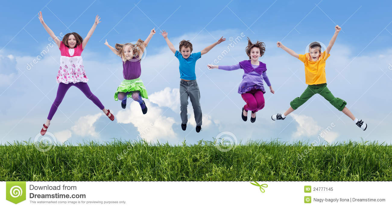Happy Children Jumping On The Spring Field