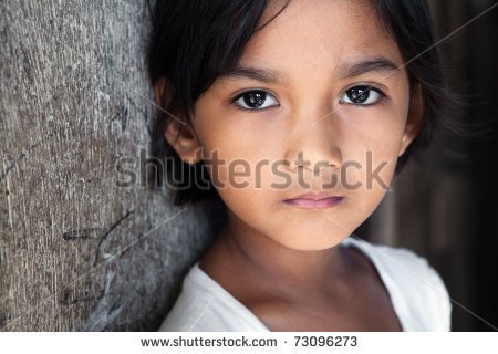 Portrait Of A Pretty 8 Year Old Filipina Girl In Poverty Stricken