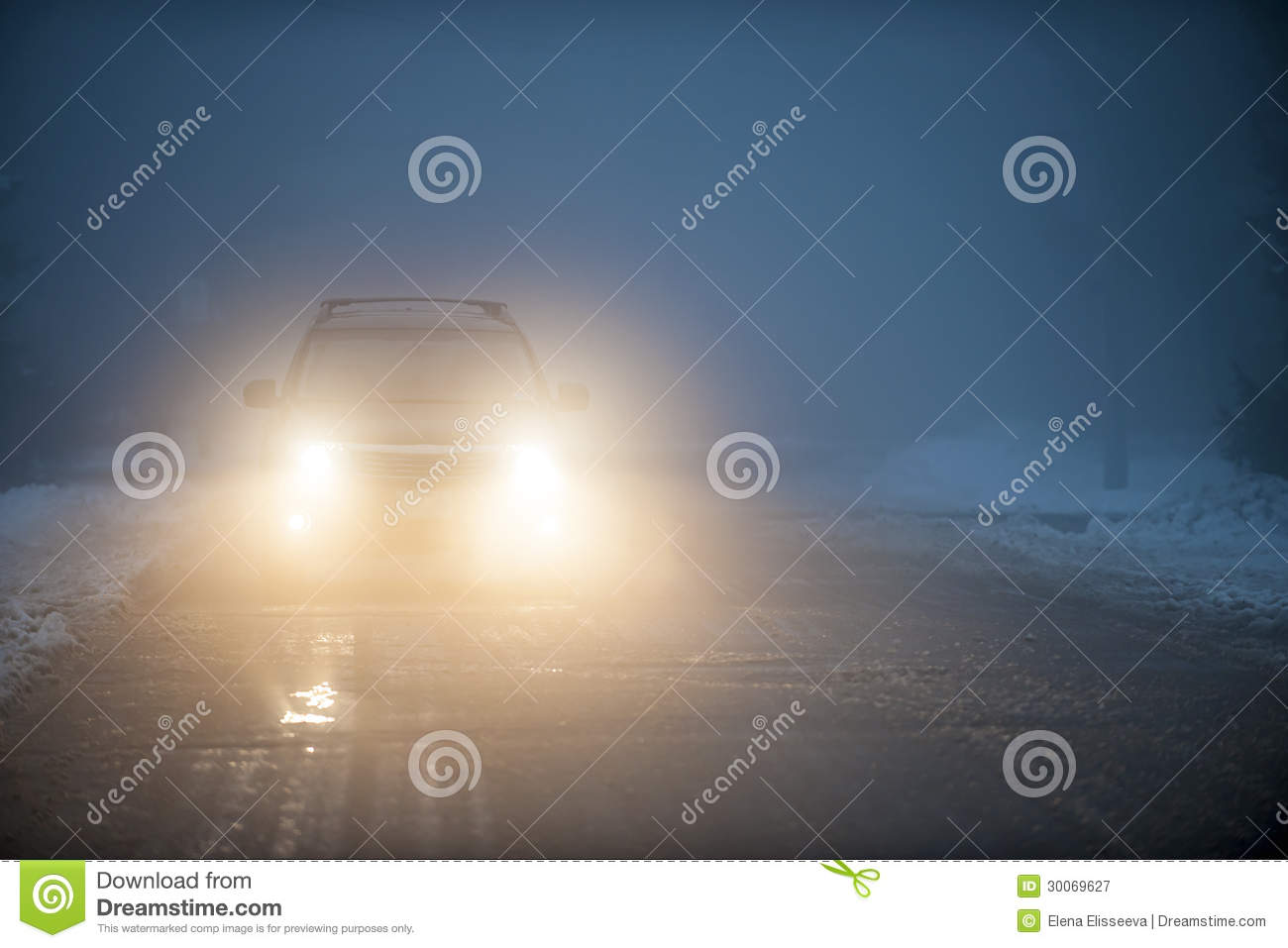 Headlights Of Car Driving In Fog Royalty Free Stock Photography