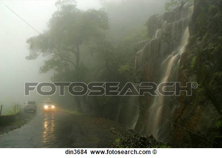 Stock Photo   Headlights Of Car On Coming On Road In Monsoon Fog Also