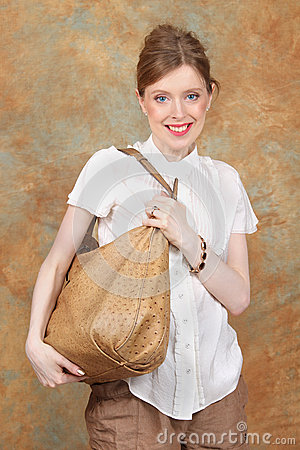 Young Fashionista Holding Her New Ostrich Leather Handbag 