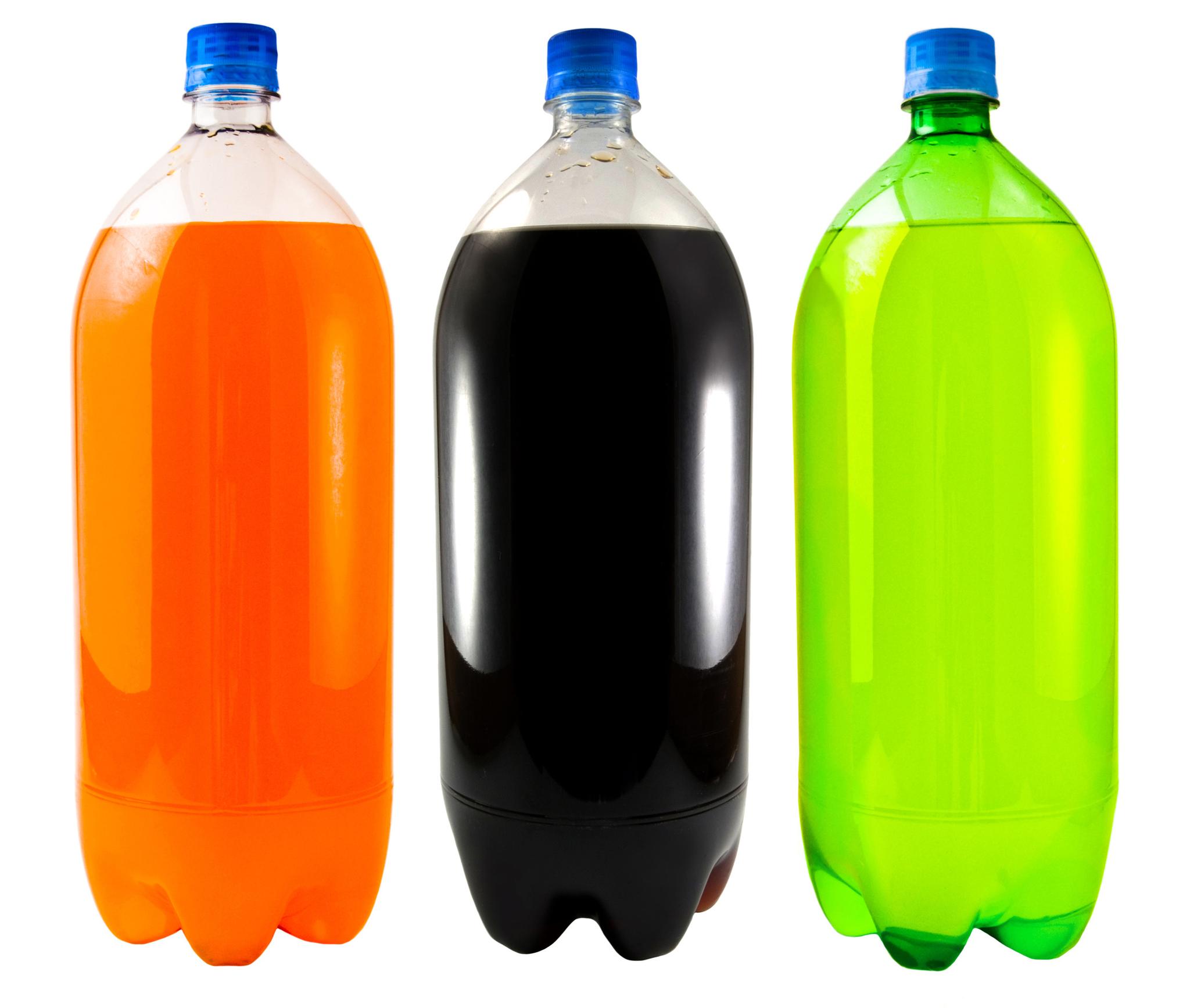 Close Up On Three Soda Bottles Isolated On A White Background    The