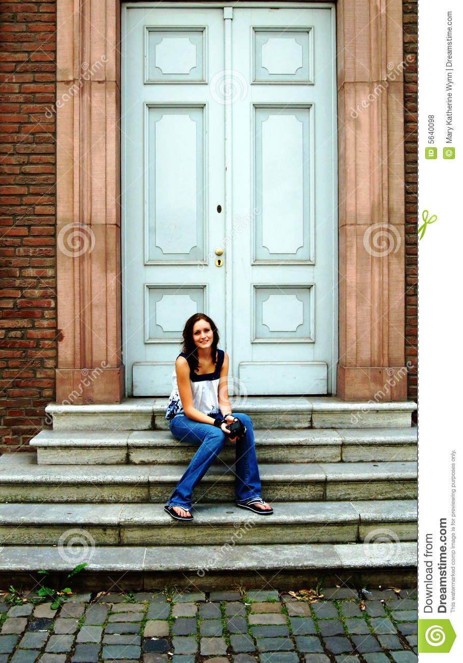 More Similar Stock Images Of   Young Woman On Steps In Front Of Door