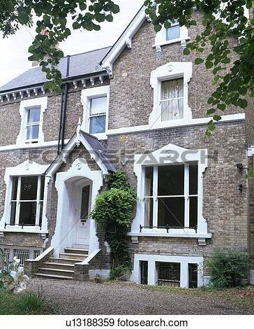Victorian Detached House With Steps Up To Front Door With Gabled Porch
