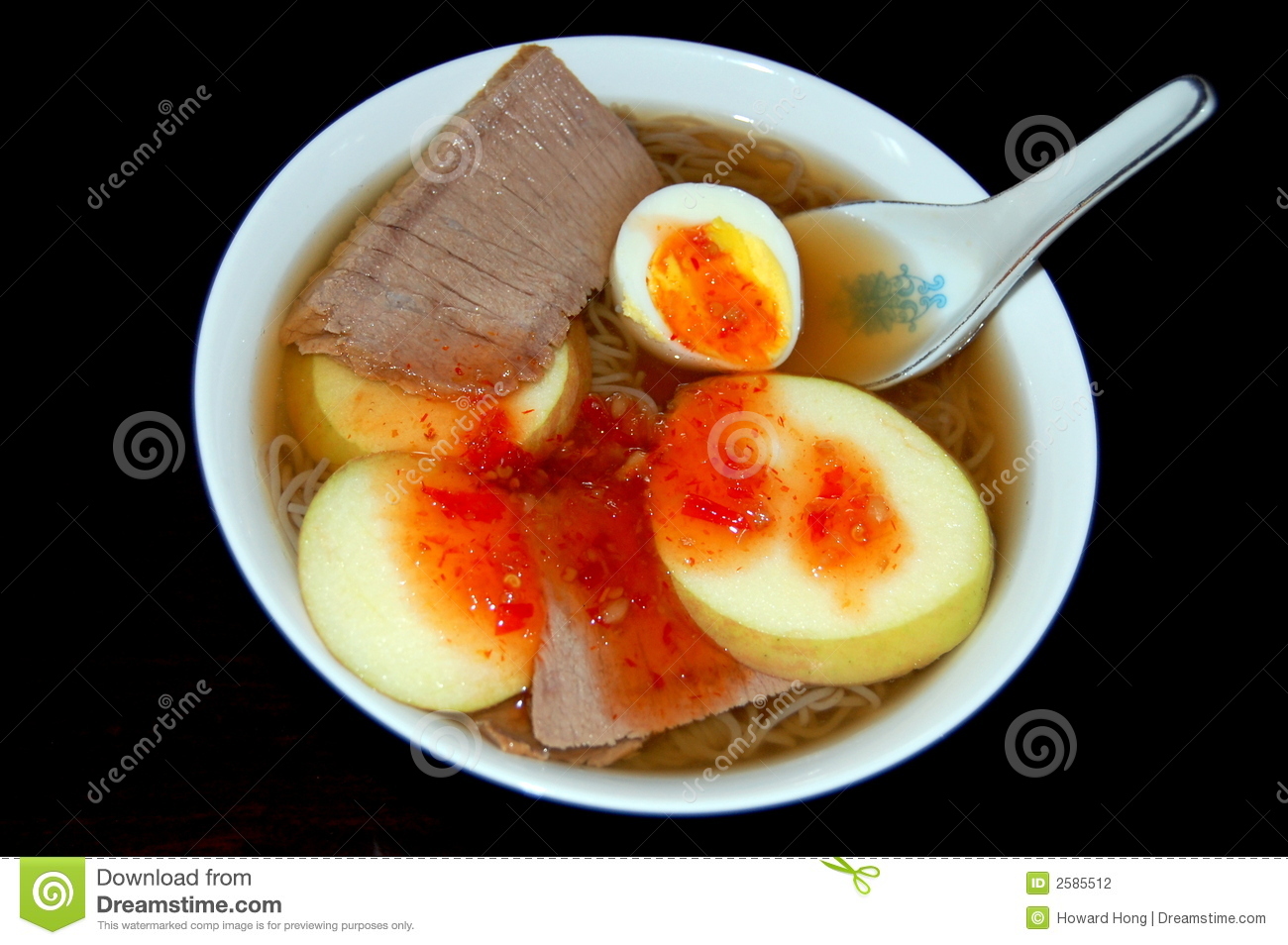 Bowl Of Korean Cold Noodle With Sliced Egg Beef And Apple