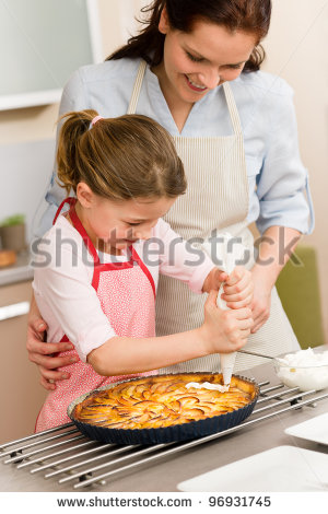     And Daughter Decorating Apple Pie With Whipped Cream   Stock Photo