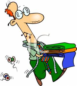Clipart Picture Of Tailor With Bolts Of Fabric
