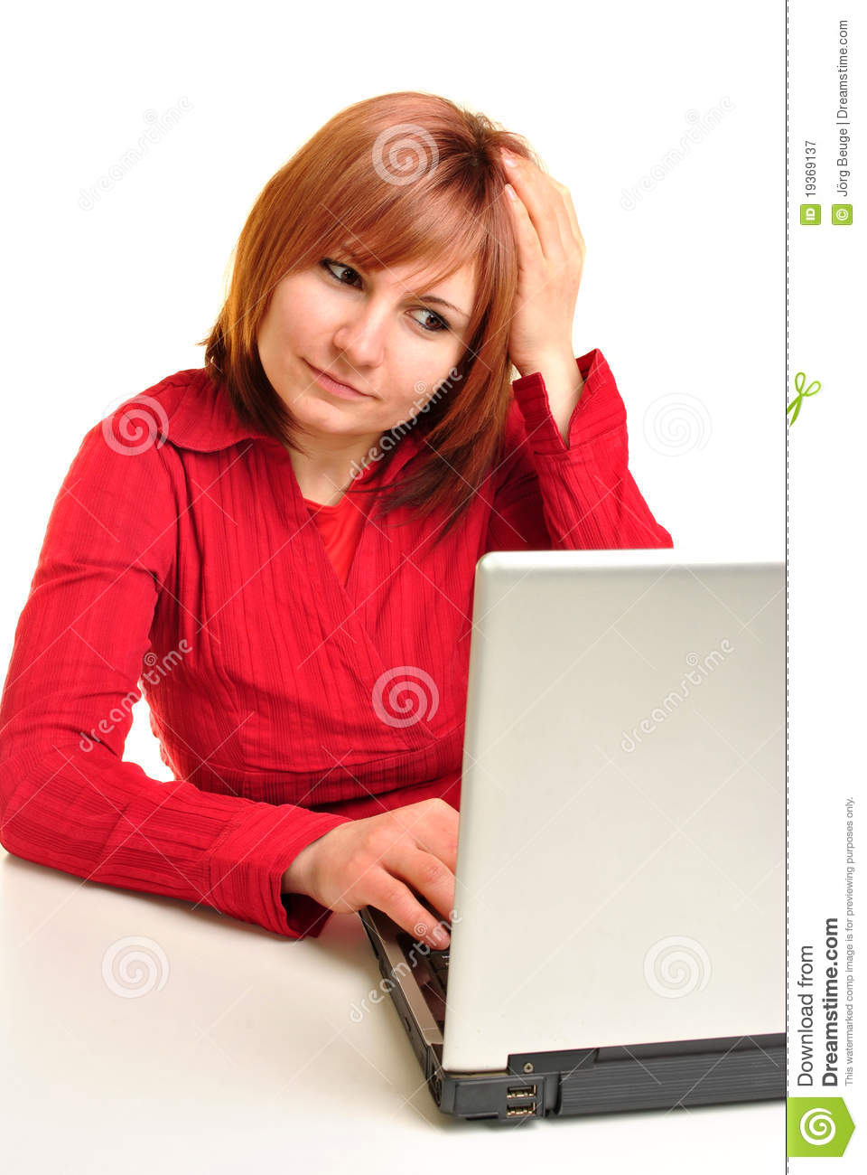 Office Assistant In A Red Blouse Royalty Free Stock Photography