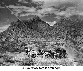 By Team Of Six Horses Through Western Landscape View Large Photo Image