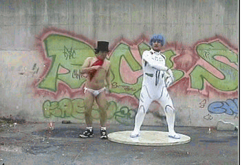 Picture Of Two Interesting Dancers On The Street In Weird Attire