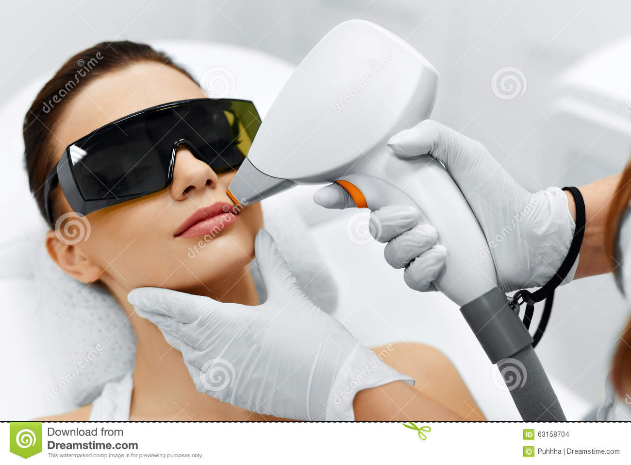 Face Care  Facial Laser Hair Removal  Beautician Giving Laser
