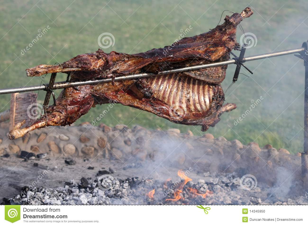Delicious Roast Lamb On A Spit Over An Open Fire