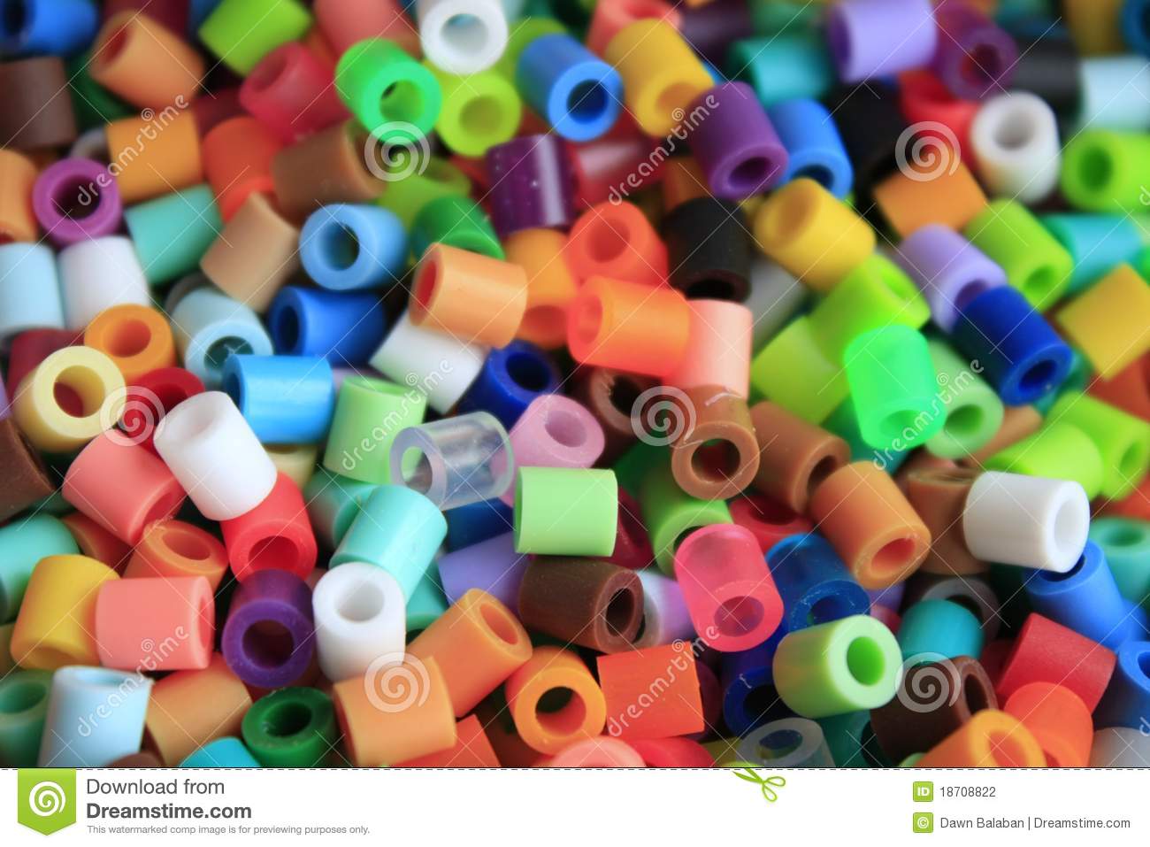     Of A Loose Group Of Singular Multicolor Plastic Beads In Tube Shapes