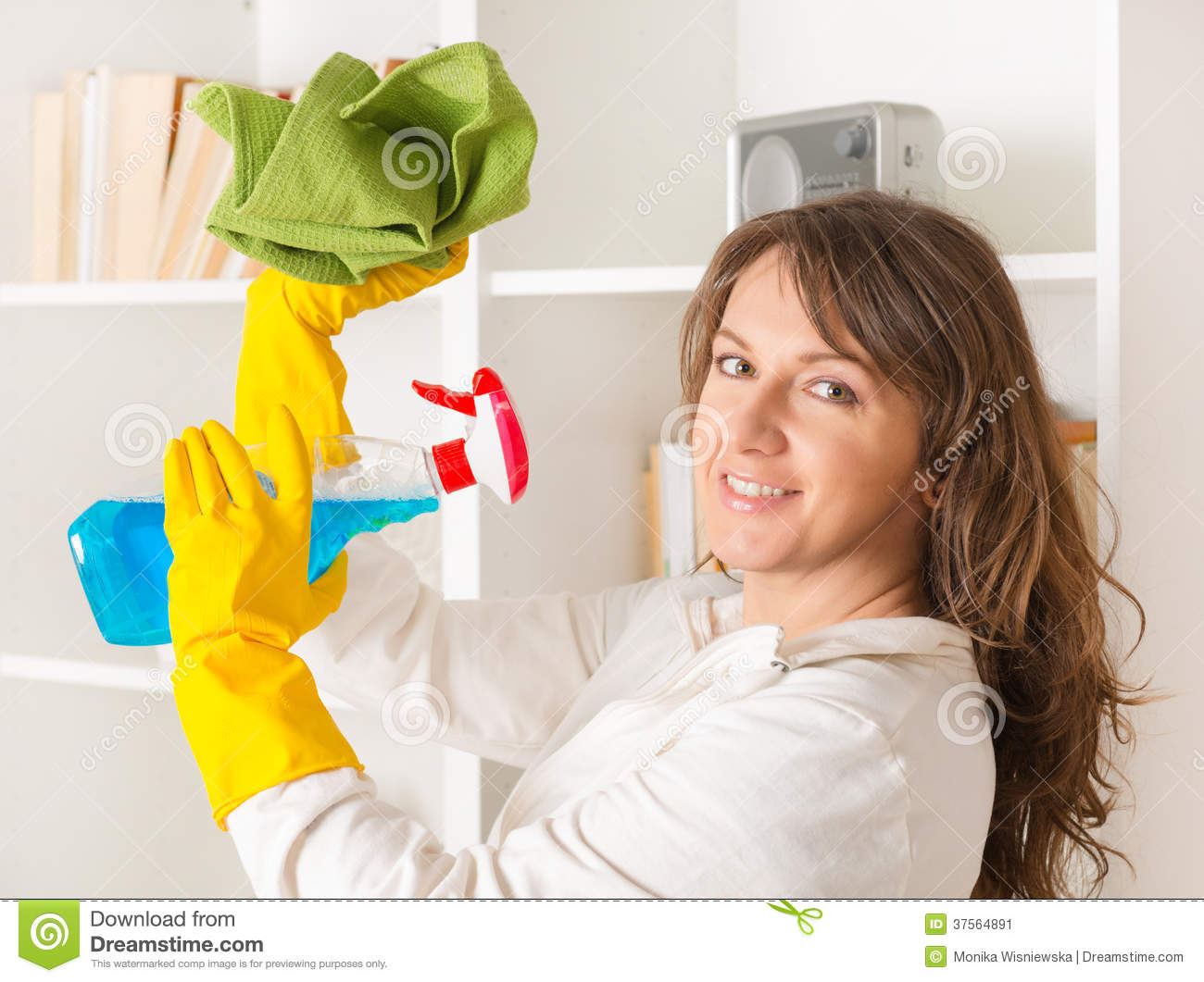 Beautiful Young Woman Cleaning Her House Wearing Yellow Gloves With    