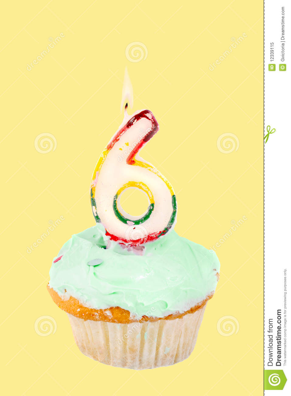 Sixth Birthday Cupcake With Green Frosting On A Yellow Background 