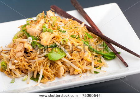 Thai Dish Of Chicken And Noodles Stir Fry Presented On A Square    