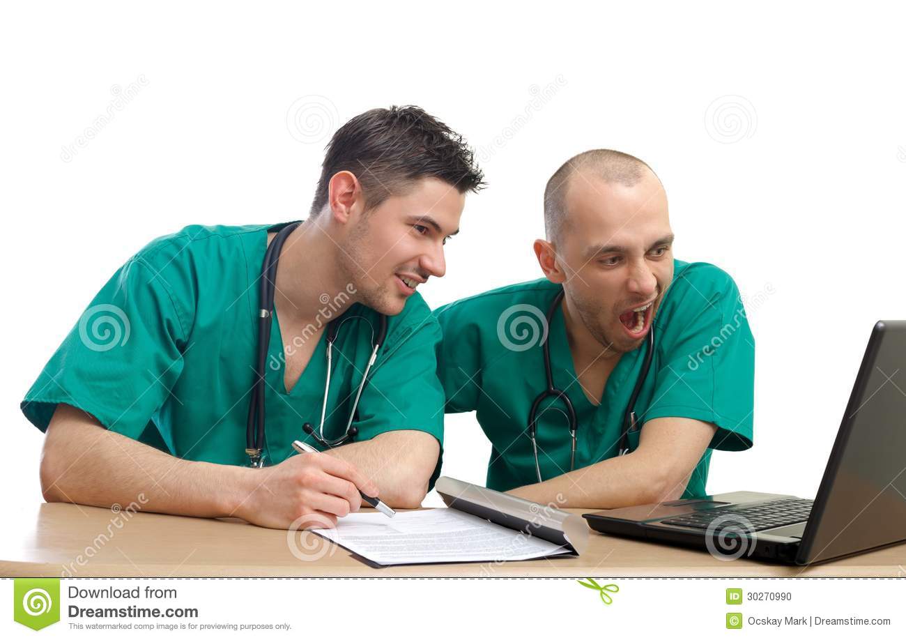 Portrait Of Two Bored And Tired Doctors On Isolated Background