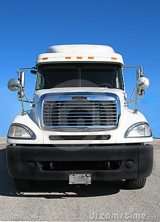 The Front View Of A Semi Or Tractor Trailer Truck On A Sunny Day   