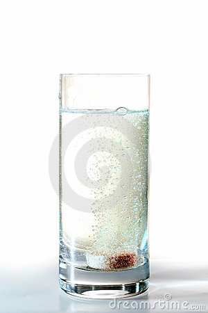 Fizzy Tablet Containing Vitamins And Minerals Dissolving In A Glas    