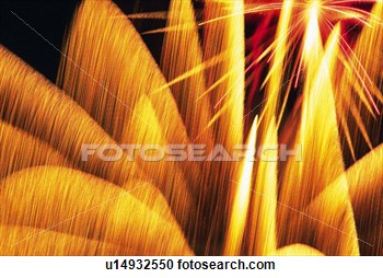 Stock Photography Of Orange Colored Fireworks Exploding In The Night