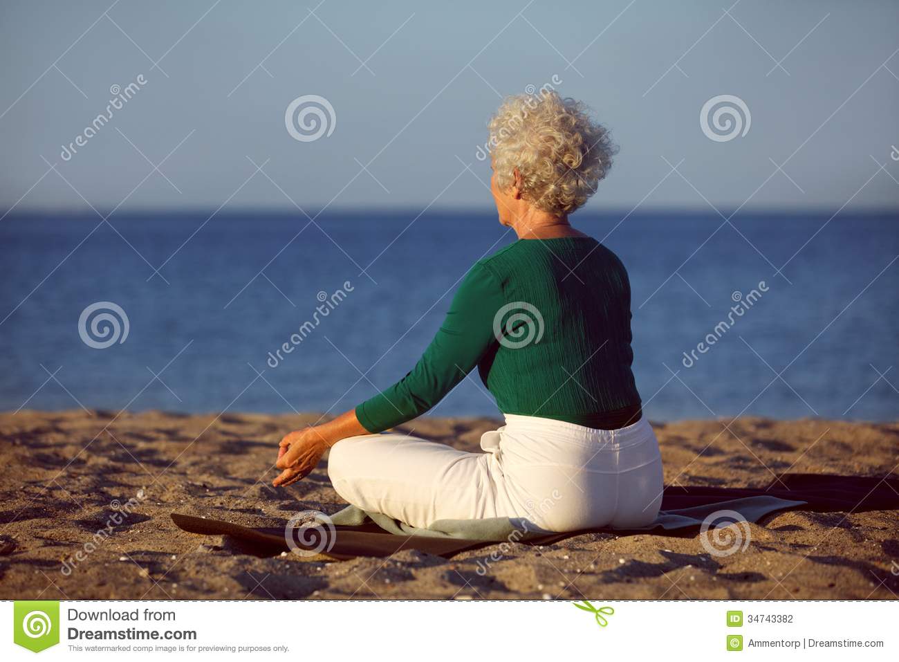 Senior Woman Doing Yoga Meditation On Beach Stock Photography   Image