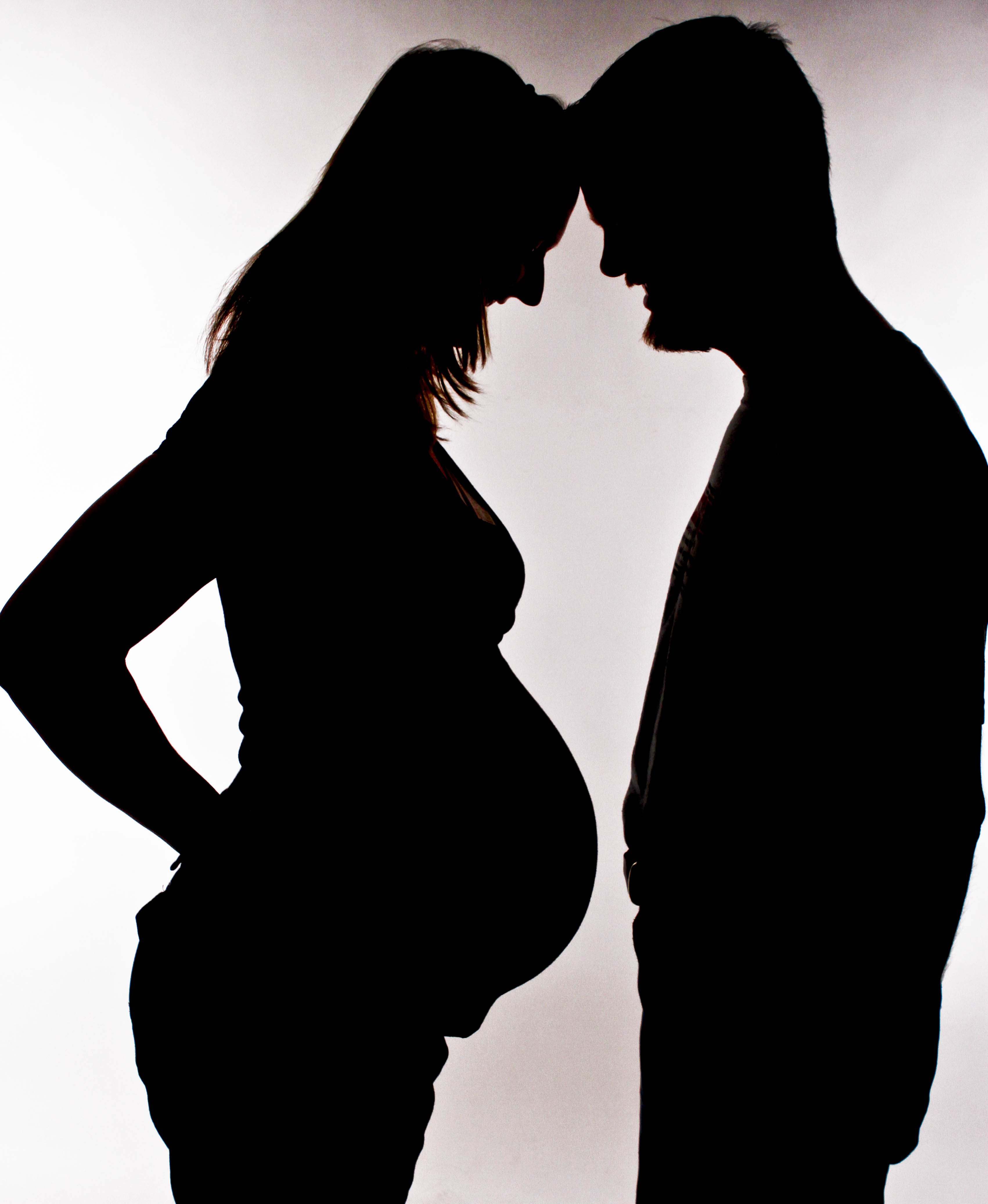 Description Silhouette Or A Pregnant Woman And Her Partner 14aug2011