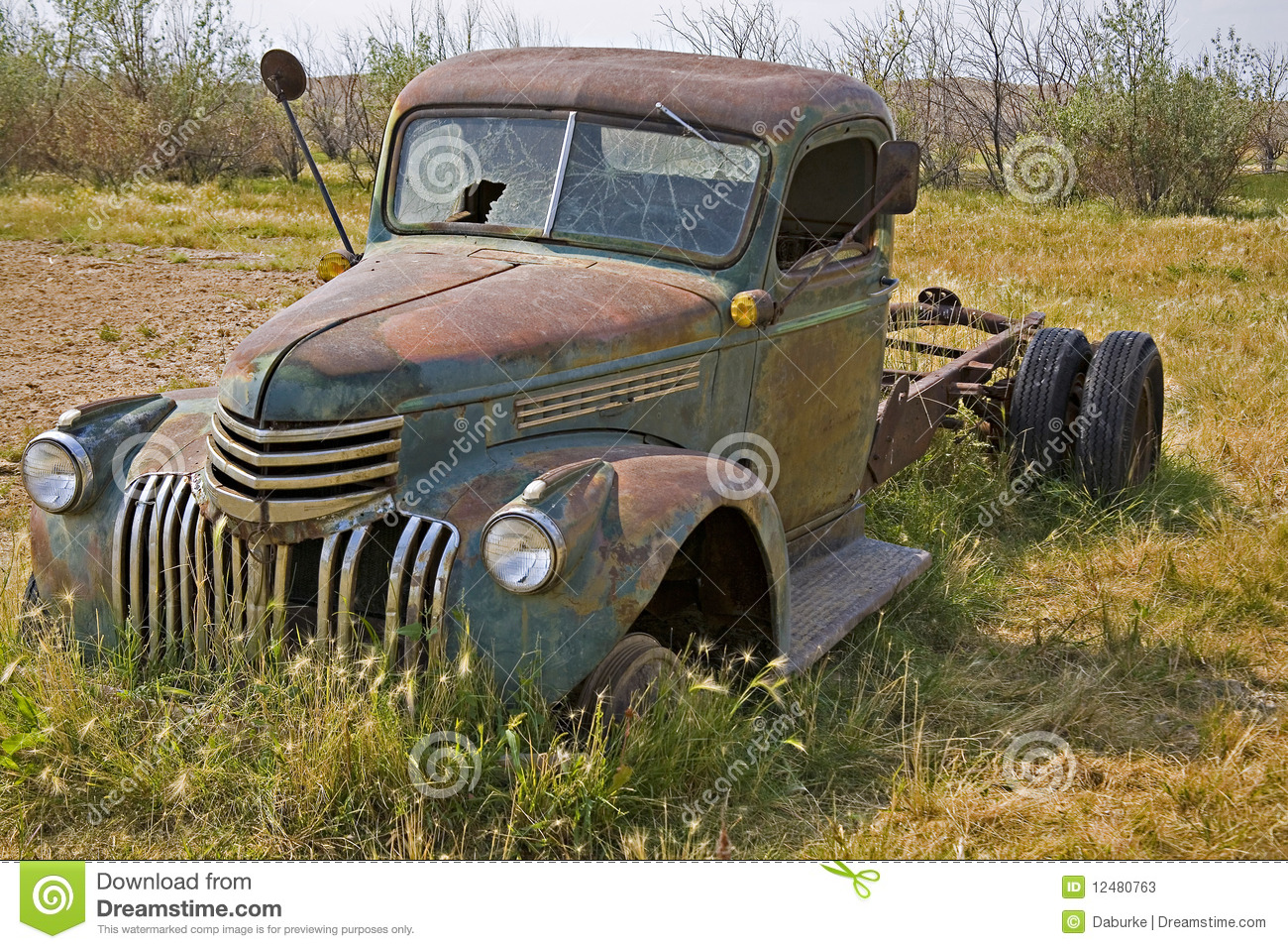 1930s Chevrolet Truck Is Parked In A Weedy Wyoming Farmers Field    