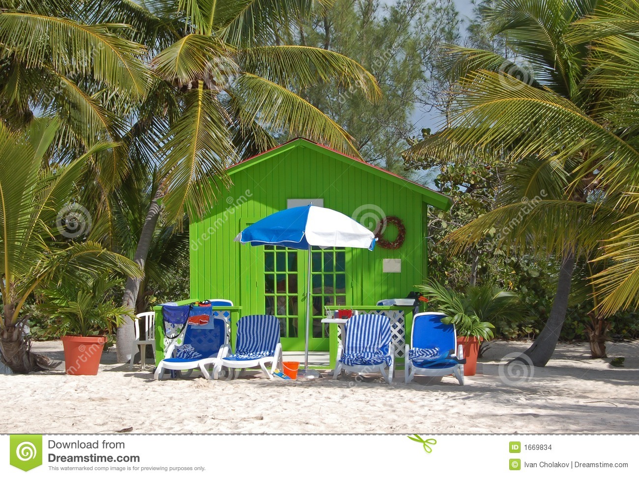 Relaxing Beach Escape In Small Green Bungalow Stock Images   Image