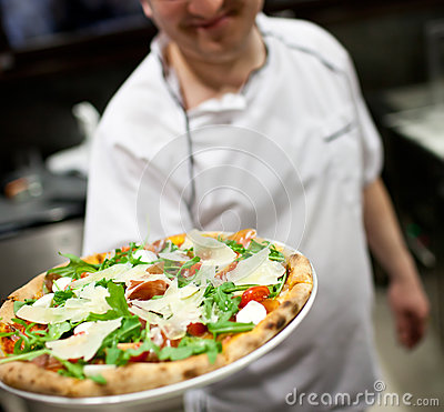 Chef Making Pizza At Kitchen Stock Photos   Image  35589233