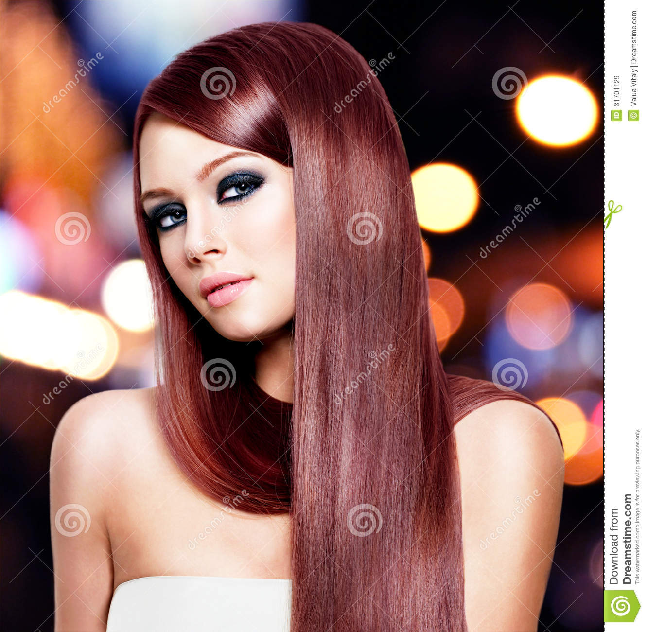 Portrait Of Beautiful Woman With Long Straight Hair