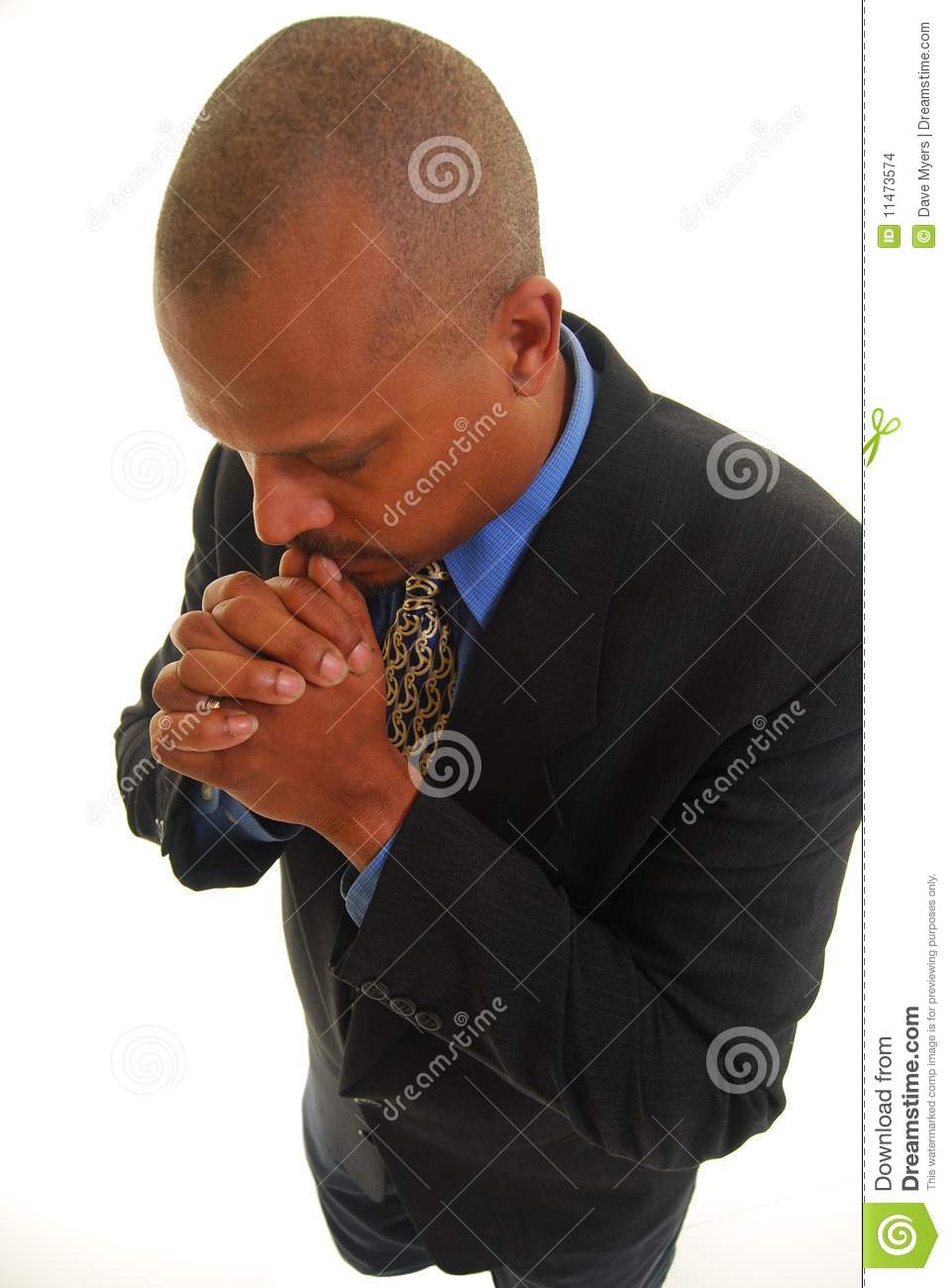 African American Man Praying Isolated On White