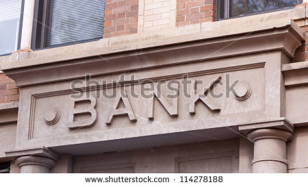 Bank Sign Carved In Stone On Building In Historic Downtown   Stock